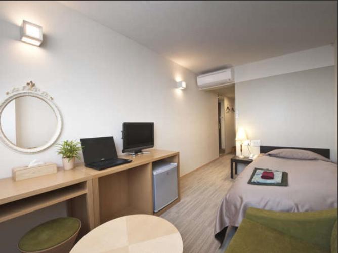 TV a/nebo společenská místnost v ubytování Hotel Nanpuso