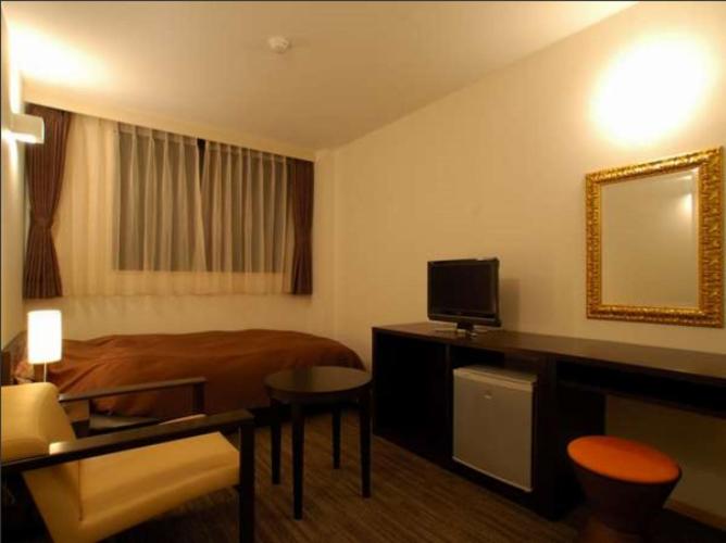 TV a/nebo společenská místnost v ubytování Hotel Nanpuso