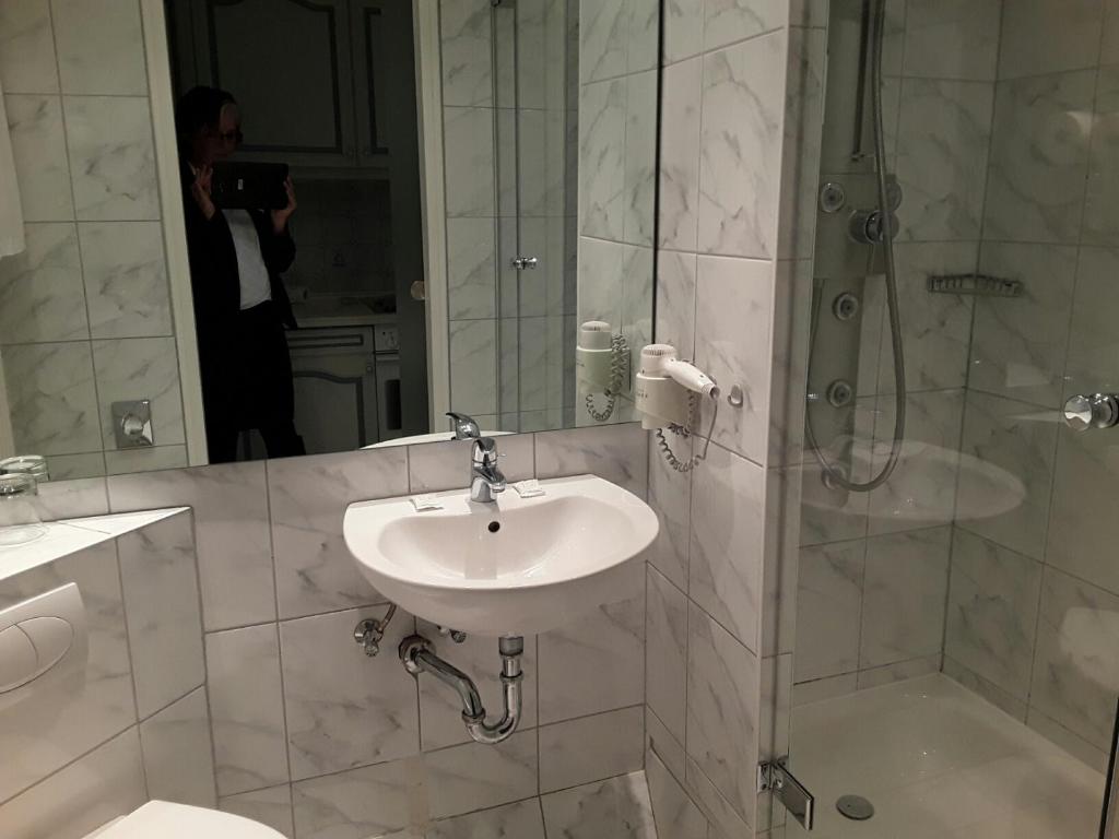 Koupelna v ubytování Top Appartements Roth am Strande