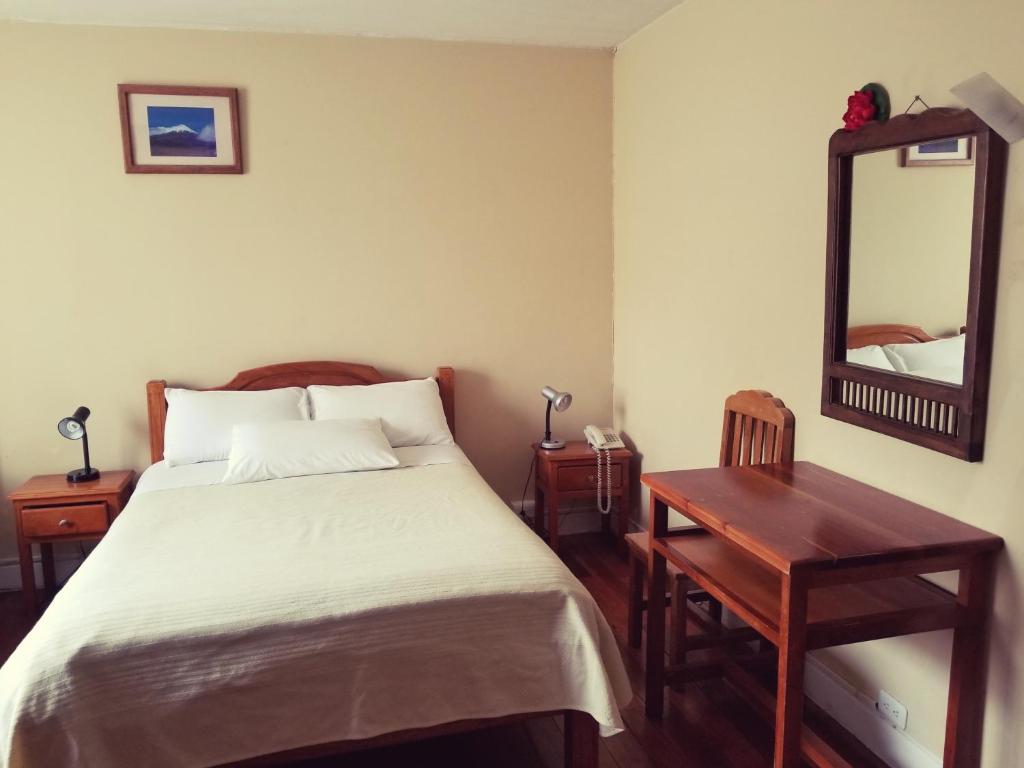 Postel nebo postele na pokoji v ubytování Travellers Inn