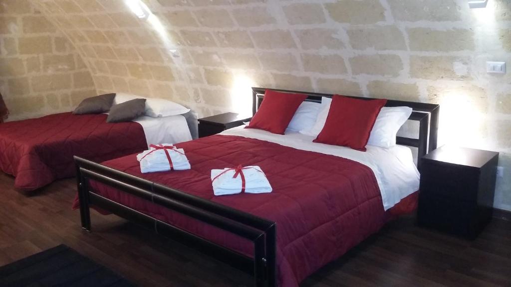 Postel nebo postele na pokoji v ubytování Il Brigante