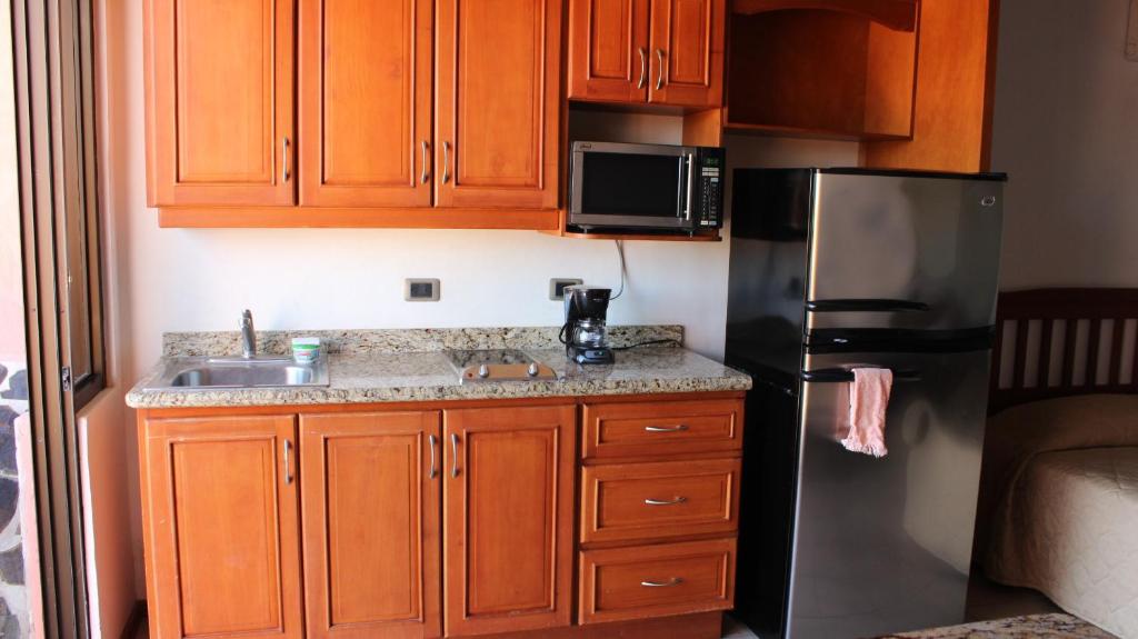 Kuchyň nebo kuchyňský kout v ubytování Flamingo Marina Hotel