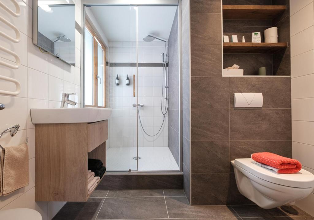 Koupelna v ubytování Hotel Les Etagnes