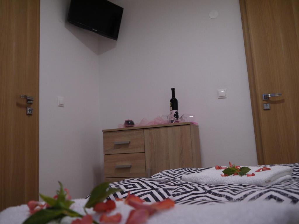 TV a/nebo společenská místnost v ubytování Pizzéria Viktória
