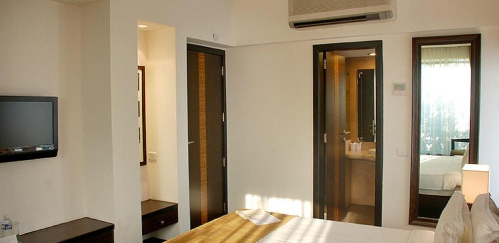 Postel nebo postele na pokoji v ubytování Hotel Metropole