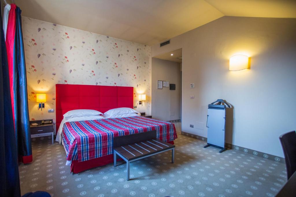 Postel nebo postele na pokoji v ubytování Hotel Fortyfive