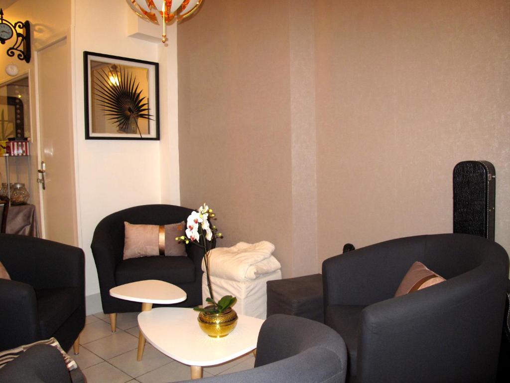 Posezení v ubytování Nouvel Hotel