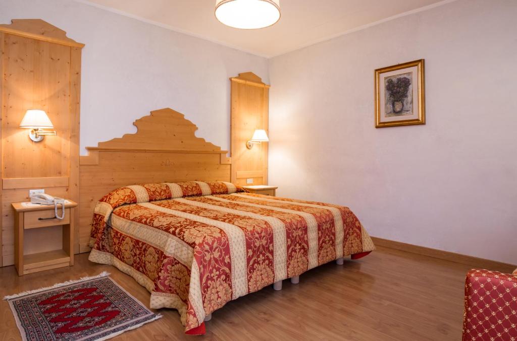 Posteľ alebo postele v izbe v ubytovaní Hotel Al Prato
