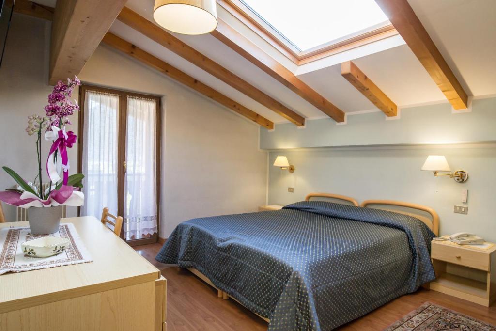 Posteľ alebo postele v izbe v ubytovaní Hotel Al Prato