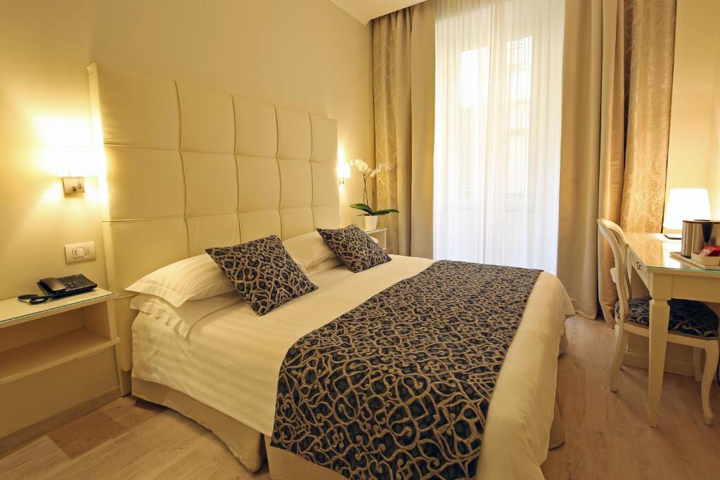 Postel nebo postele na pokoji v ubytování Hotel Du Lac & SPA