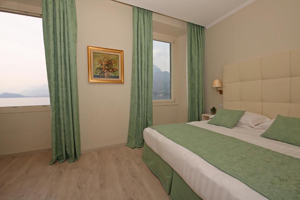 Postel nebo postele na pokoji v ubytování Hotel Du Lac & SPA