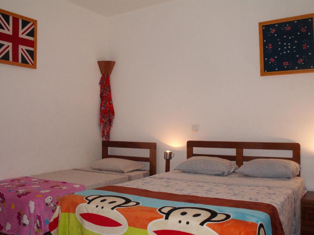 Postel nebo postele na pokoji v ubytování Edificio Magico