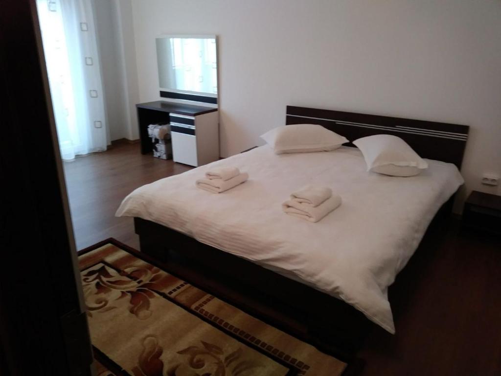 Кровать или кровати в номере Alexys Residence 7