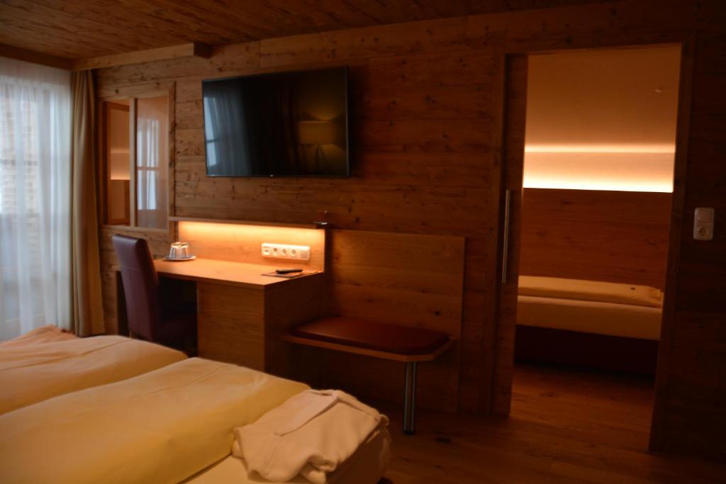 Postel nebo postele na pokoji v ubytování Natur-Genuss-Hotel Sonnasita
