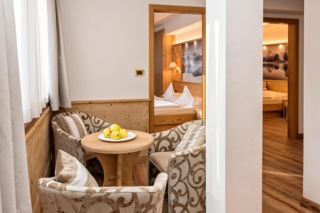 Postel nebo postele na pokoji v ubytování Hotel Armin