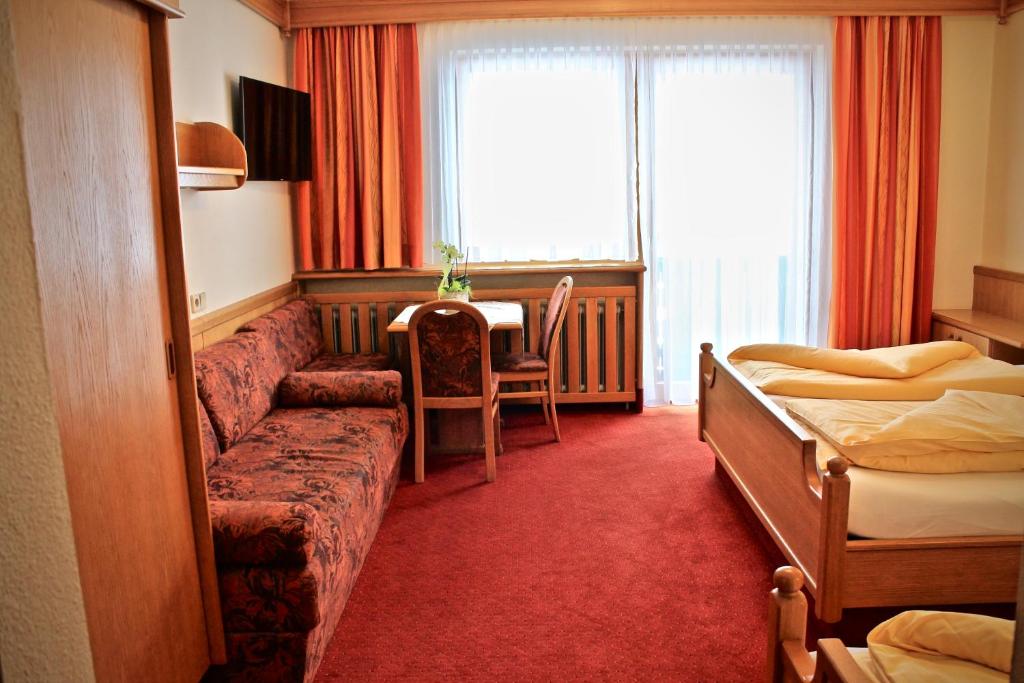 Postel nebo postele na pokoji v ubytování Hotel Druschhof