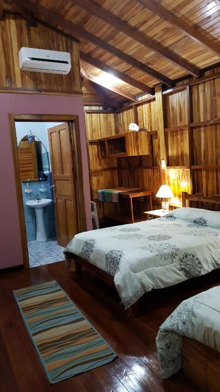 Postel nebo postele na pokoji v ubytování Ciudad Perdida EcoLodge