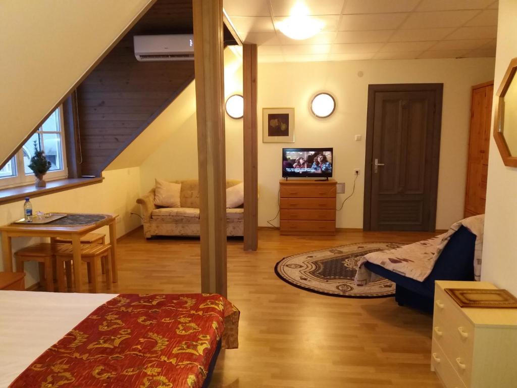 Postel nebo postele na pokoji v ubytování Sunrise majutus