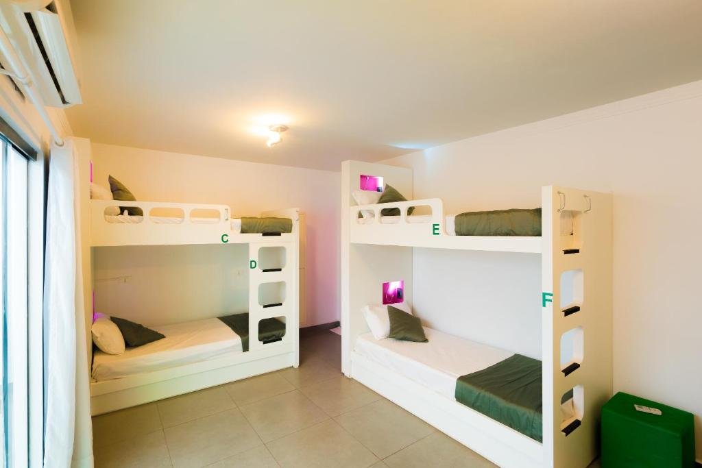 Postel nebo postele na pokoji v ubytování Concept Design Hostel & Suites