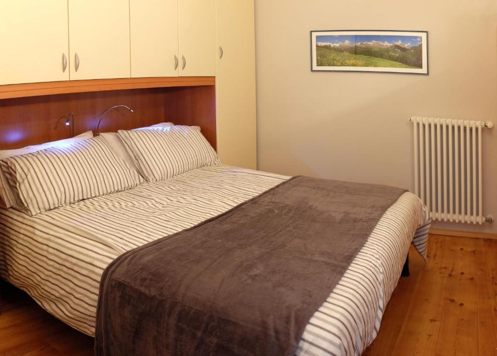 A bed or beds in a room at Casa Monet