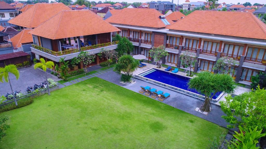 an aerial view of a house with a yard at Kubu Cempaka Seminyak in Seminyak