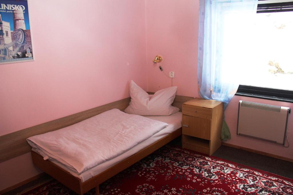 Postel nebo postele na pokoji v ubytování Penzion Gentiana