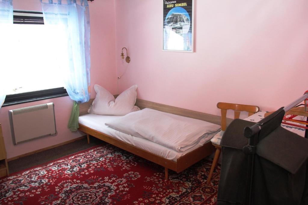 Postel nebo postele na pokoji v ubytování Penzion Gentiana