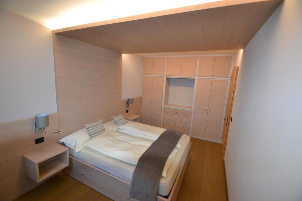 A bed or beds in a room at Casa Urbani