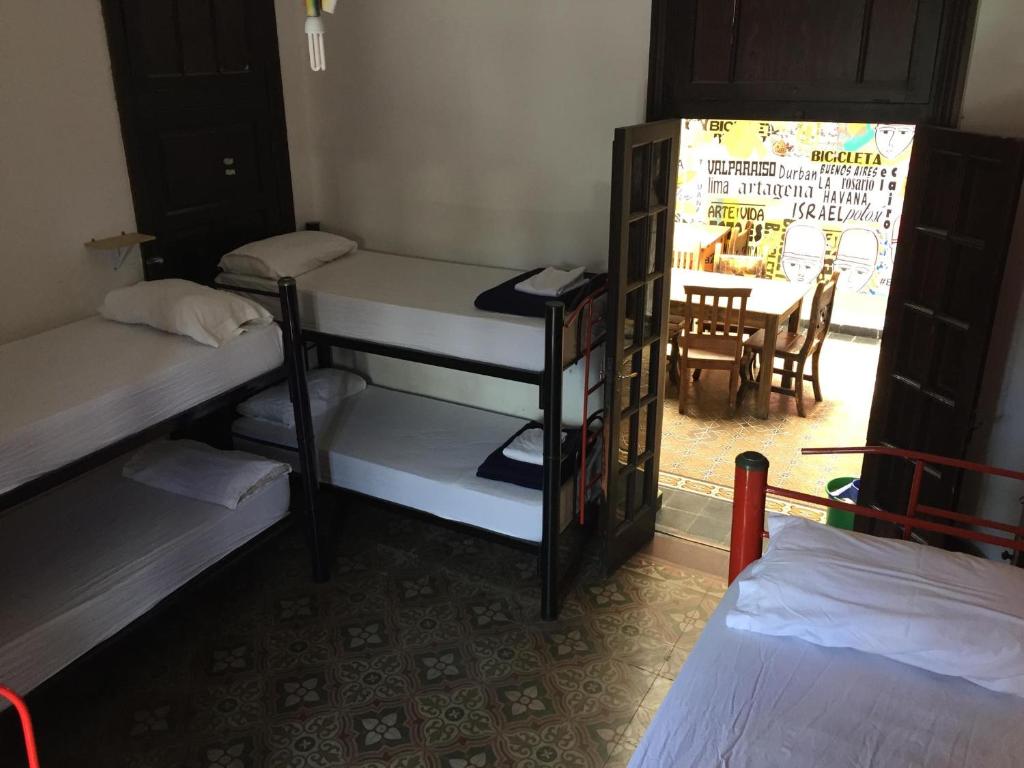 Postel nebo postele na pokoji v ubytování Rivera Hostel Córdoba