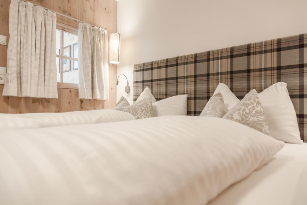 Posteľ alebo postele v izbe v ubytovaní Aparthotel Steger Wagrain