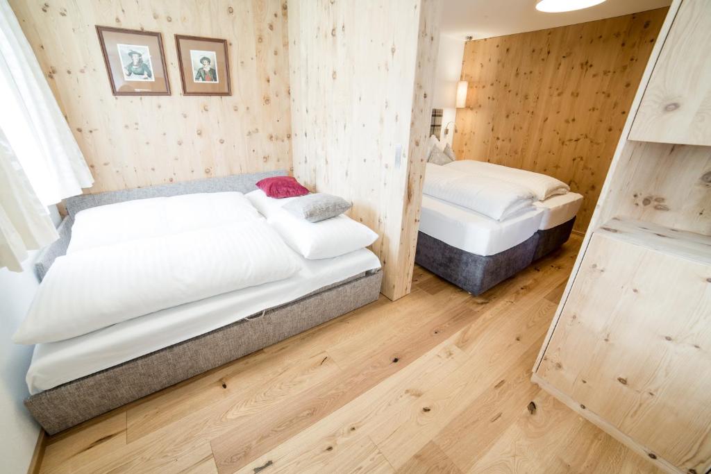 Posteľ alebo postele v izbe v ubytovaní Aparthotel Steger Wagrain