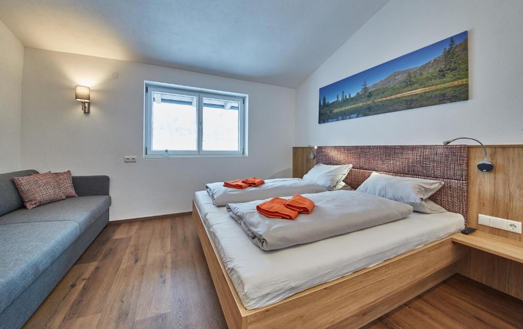 Postel nebo postele na pokoji v ubytování Holiday Penthouse Moosweg
