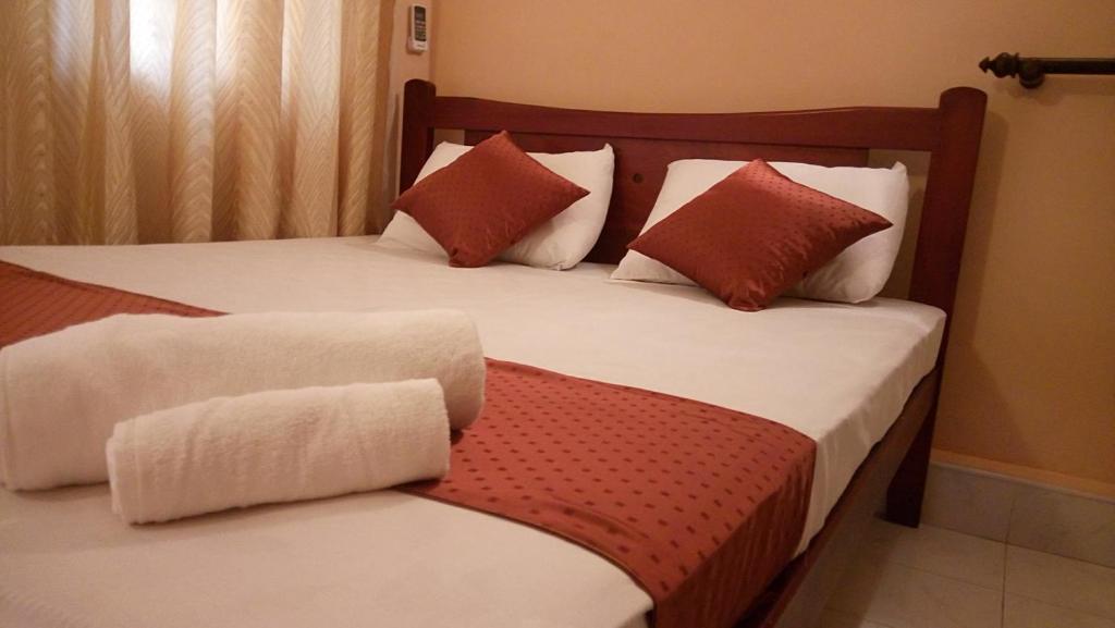 Postel nebo postele na pokoji v ubytování Grand Resort