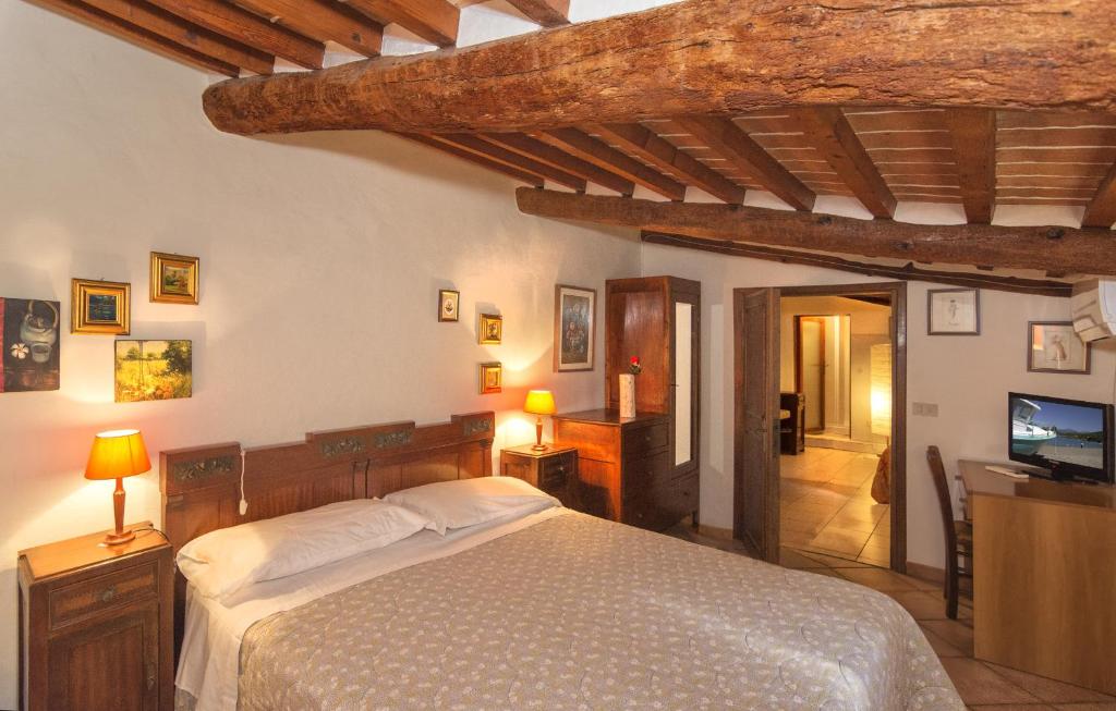 Postel nebo postele na pokoji v ubytování B&B Due Borghi
