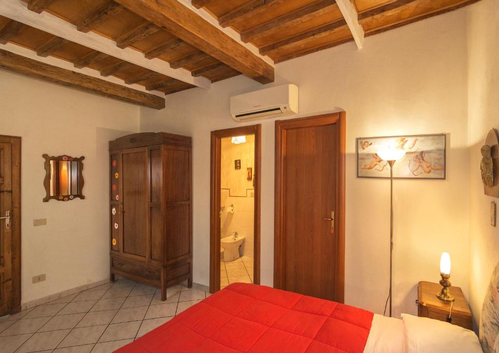 Postel nebo postele na pokoji v ubytování B&B Due Borghi