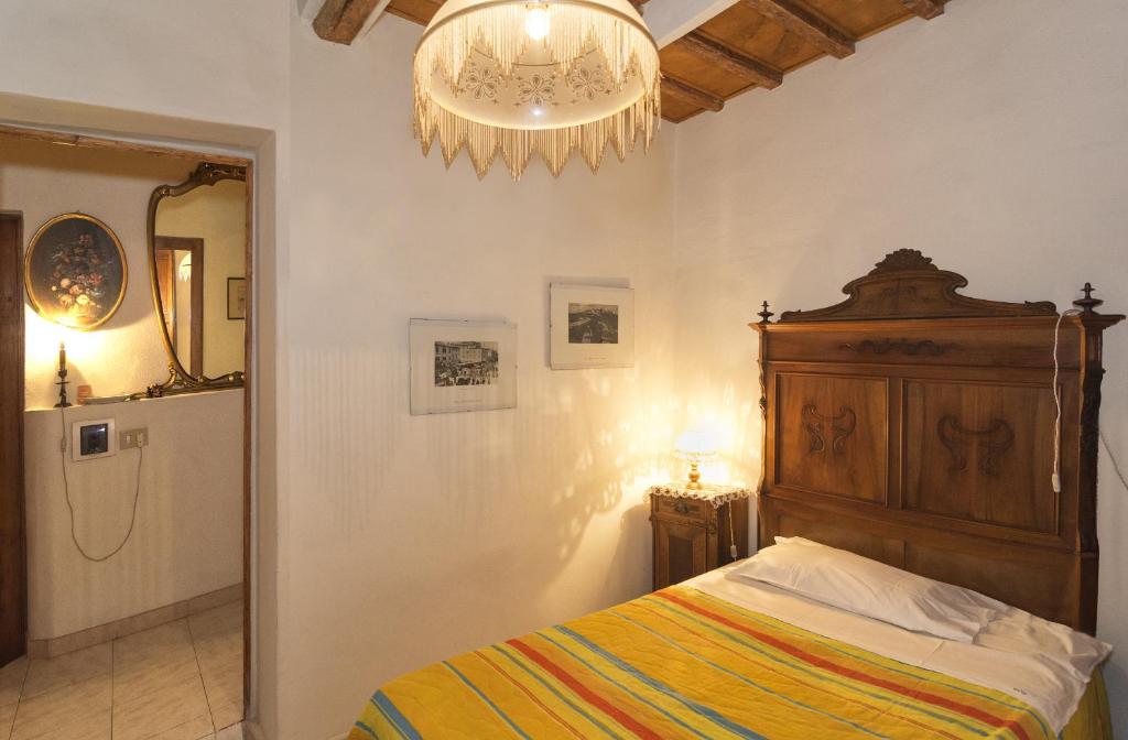Postel nebo postele na pokoji v ubytování B&B Due Borghi