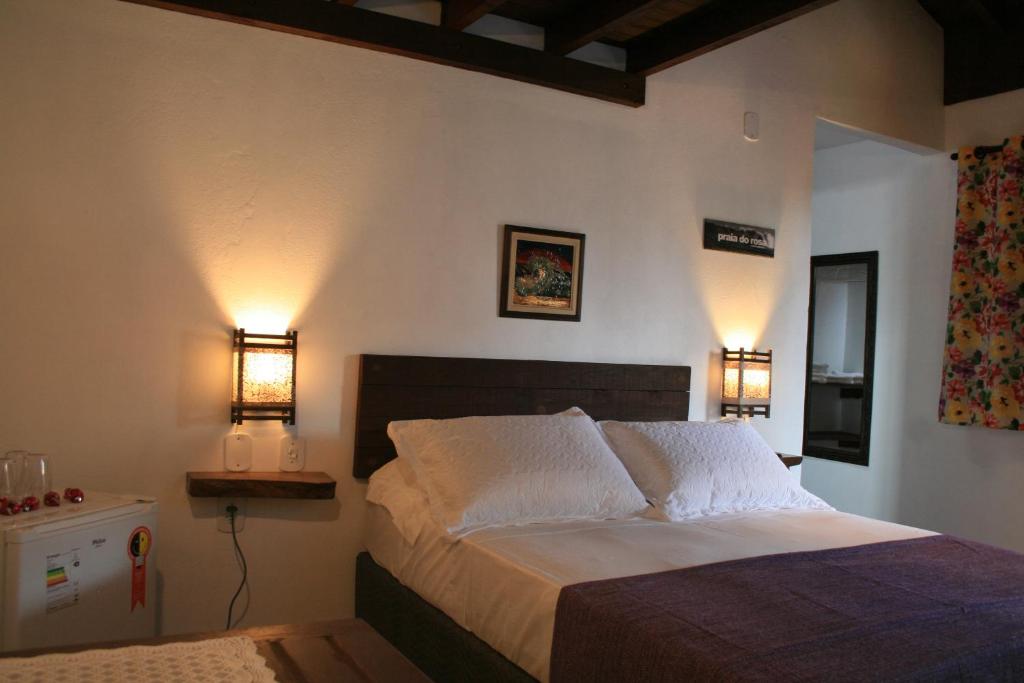 Ein Bett oder Betten in einem Zimmer der Unterkunft Santa Monica Hospedaria