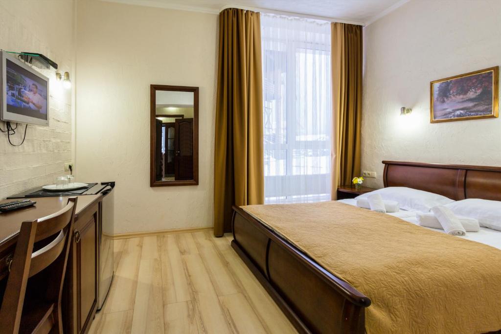 Postel nebo postele na pokoji v ubytování Villa Nova