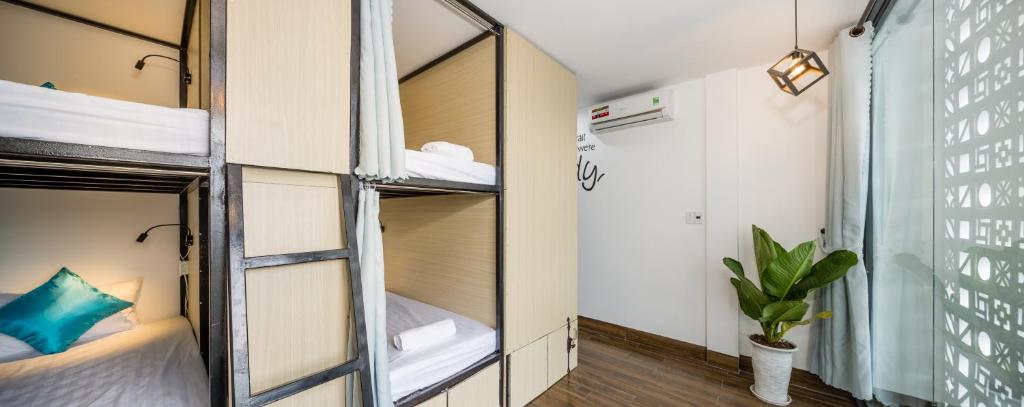 Postel nebo postele na pokoji v ubytování Fedora Hostel