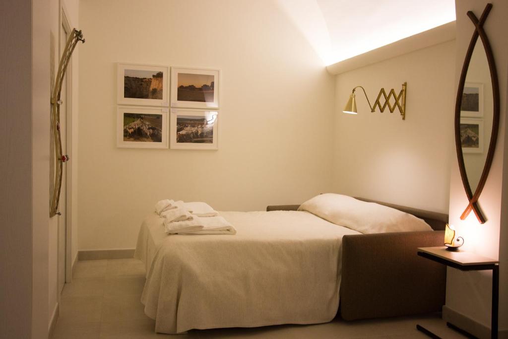 Postel nebo postele na pokoji v ubytování Ai Sottani B&B Deluxe Suite