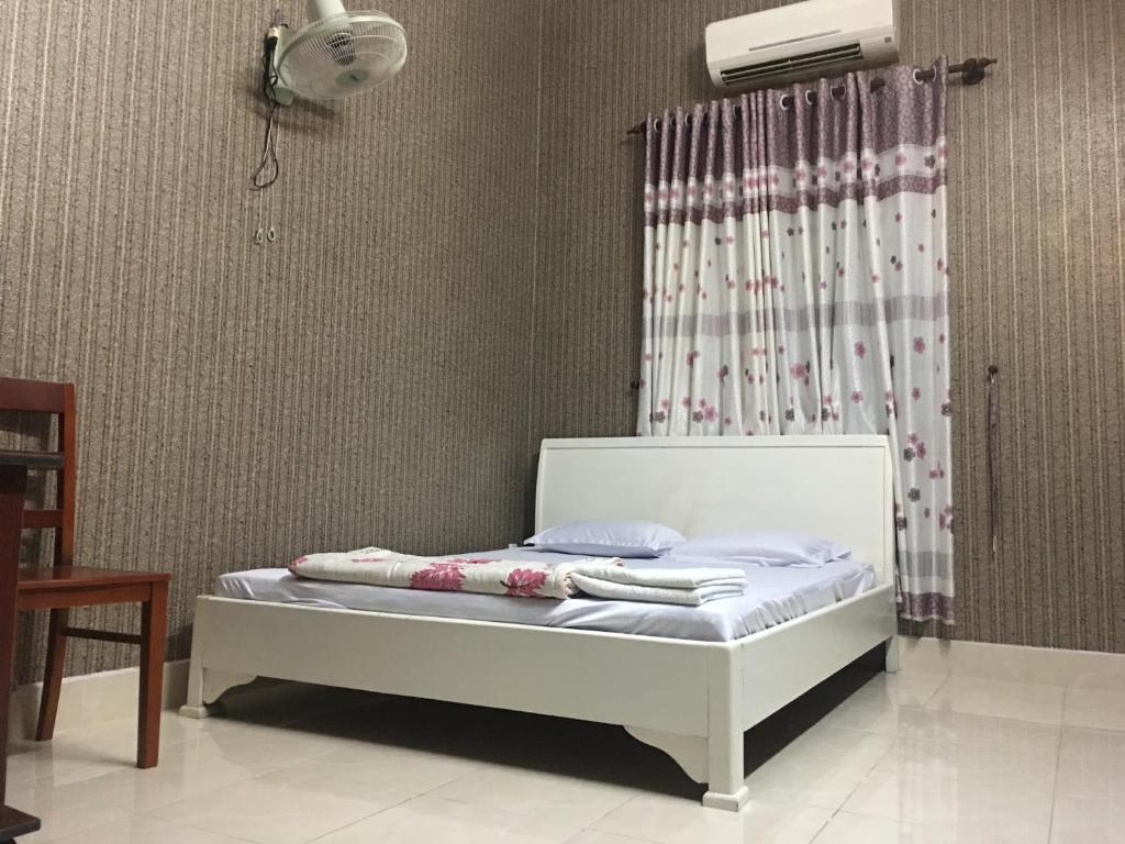 Postel nebo postele na pokoji v ubytování Thu Đô Motel