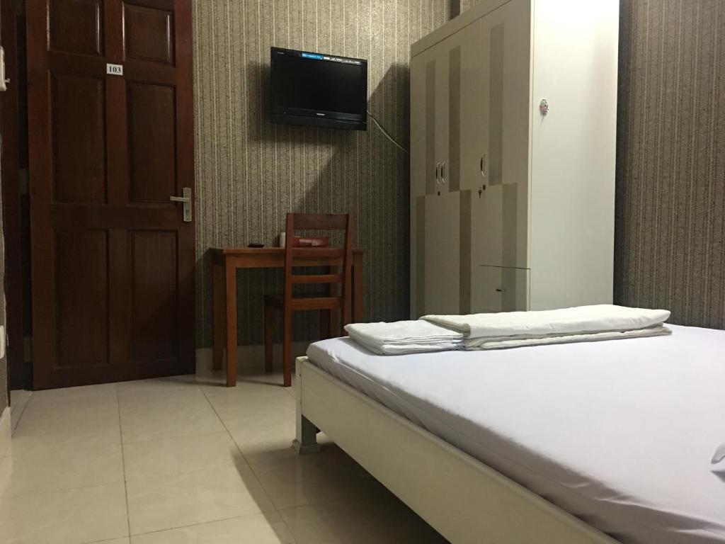 Postel nebo postele na pokoji v ubytování Thu Đô Motel