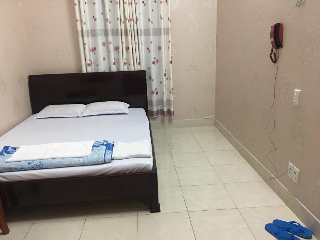 Postel nebo postele na pokoji v ubytování Thu Đô Motel