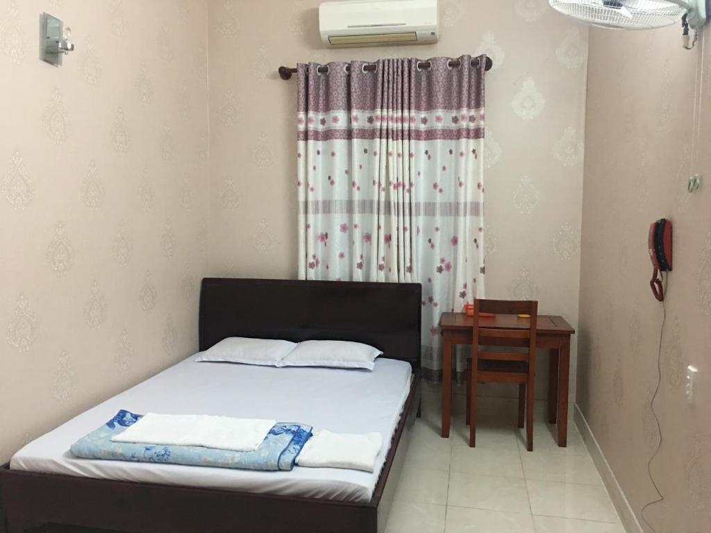 Postel nebo postele na pokoji v ubytování Thu Đô Motel