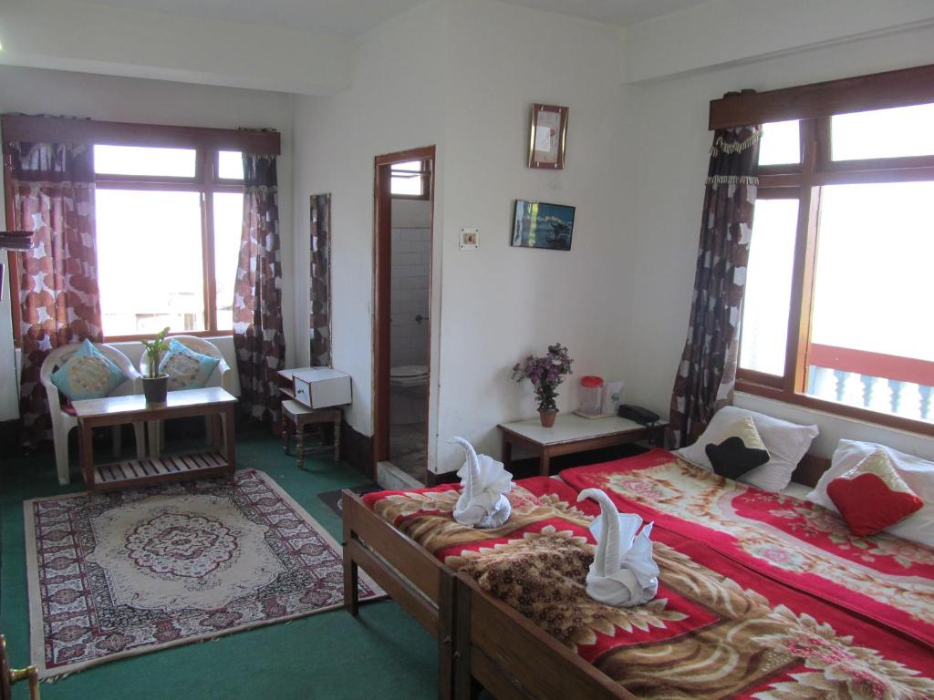 Postel nebo postele na pokoji v ubytování Hotel View Point