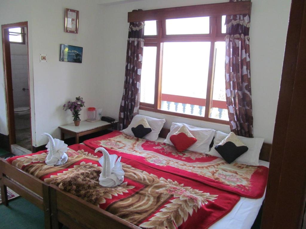 Postel nebo postele na pokoji v ubytování Hotel View Point