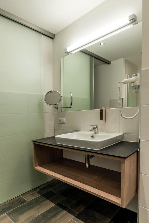 Koupelna v ubytování Appartements Ausblick