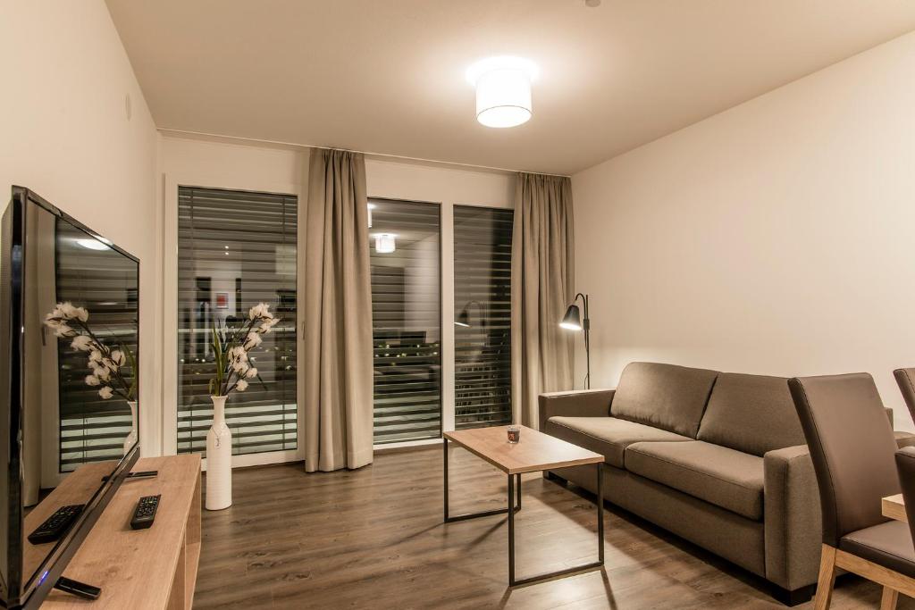 TV a/nebo společenská místnost v ubytování Appartements Ausblick