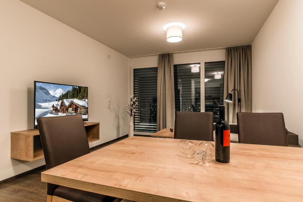 TV a/nebo společenská místnost v ubytování Appartements Ausblick