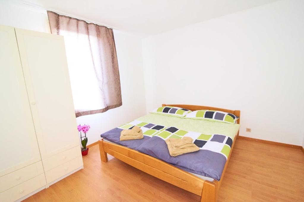 Cama o camas de una habitación en New West Station 7